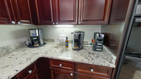 A community kitchen with complimentary coffee