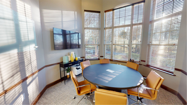 A six-person conference room with TV and HDMi