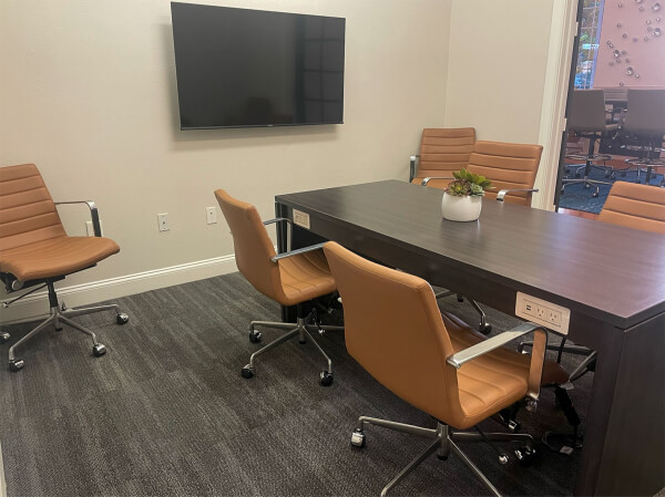 A 6 person conference room with TV and HDMi