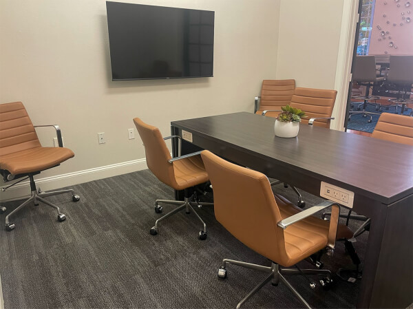 Meet with clients or coworkers in the six-person conference room