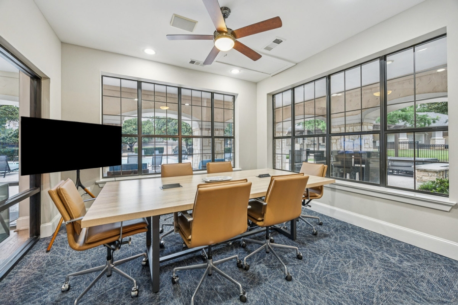 Host meetings or brainstorm big ideas in the private conference room, equipped for team productivity.
