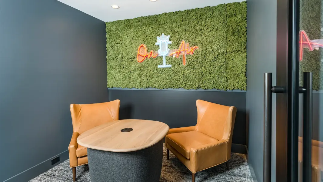 A podcast room with aesthetic background.